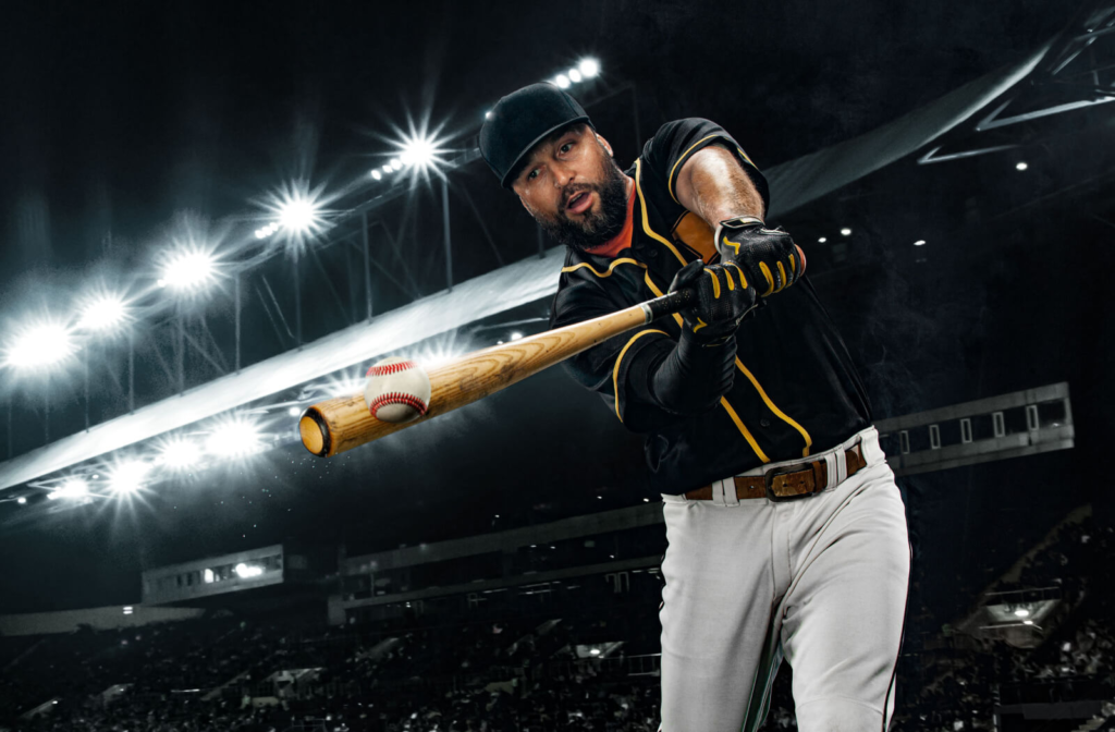 A professional baseball player demonstrating good hand-eye coordination by successfully hitting a ball with a bat.